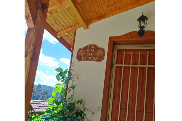 Wooden signboard with ornaments